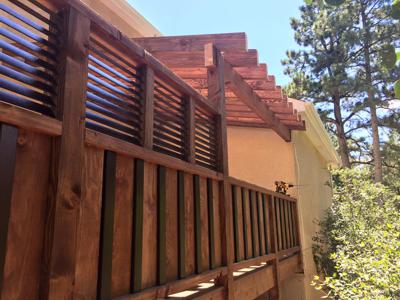 Custom Rail & Privacy Features from Woodland Park Deck Builder