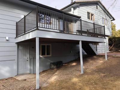 Click to view full size Steel Panel Railing from Woodland Park Deck Builder