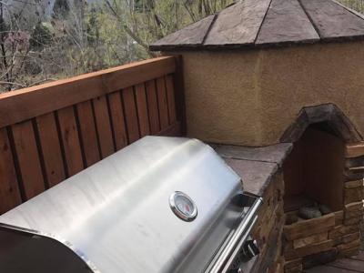 Composite Deck & Stone Patio  from Woodland Park Deck Builder