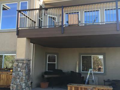 Composite Deck & Stone Patio  from Woodland Park Deck Builder
